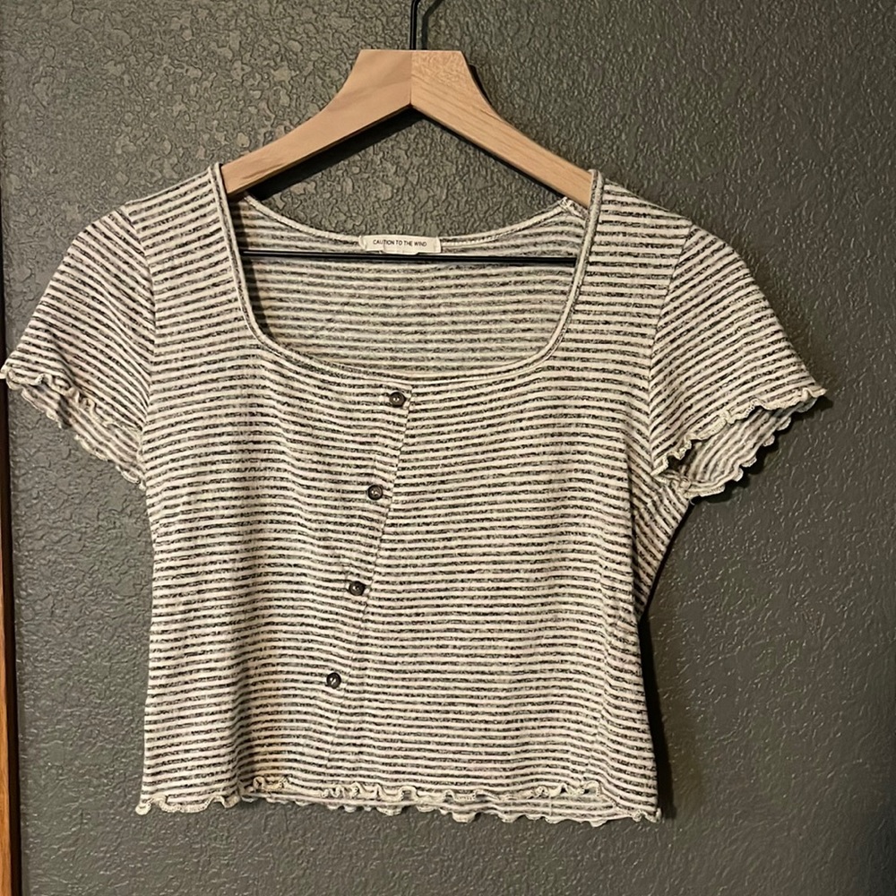 Size small. Brand - caution to the wind